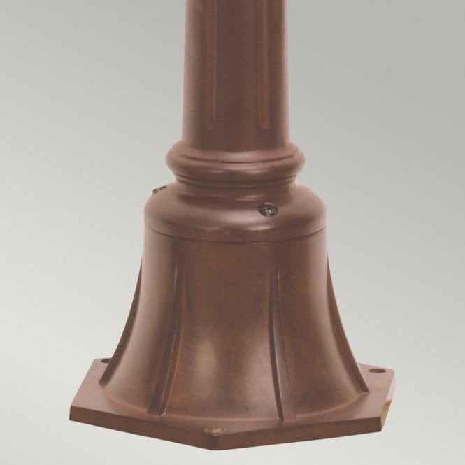 Chicago Pillar Lantern Small with a rusty bronze patina finish